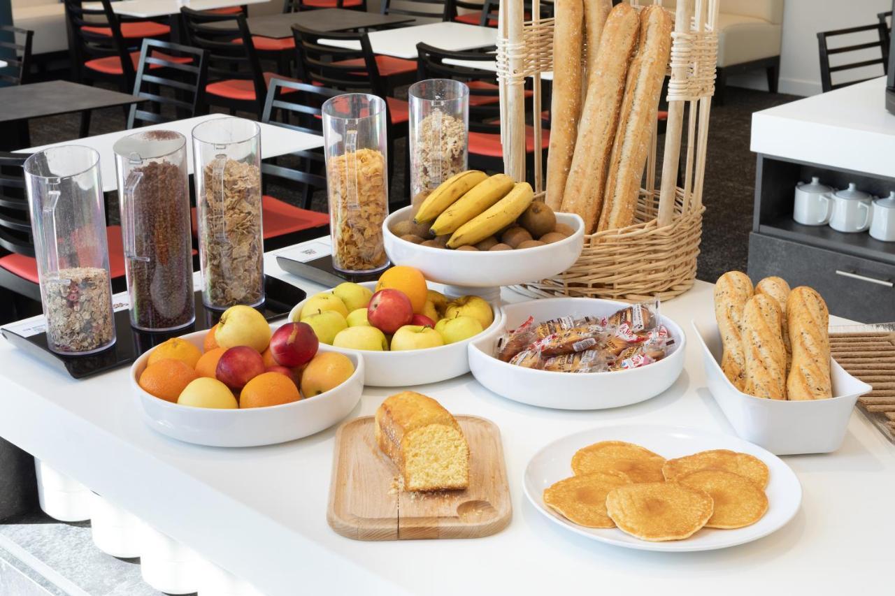 Express - Est By Ihg Tolone